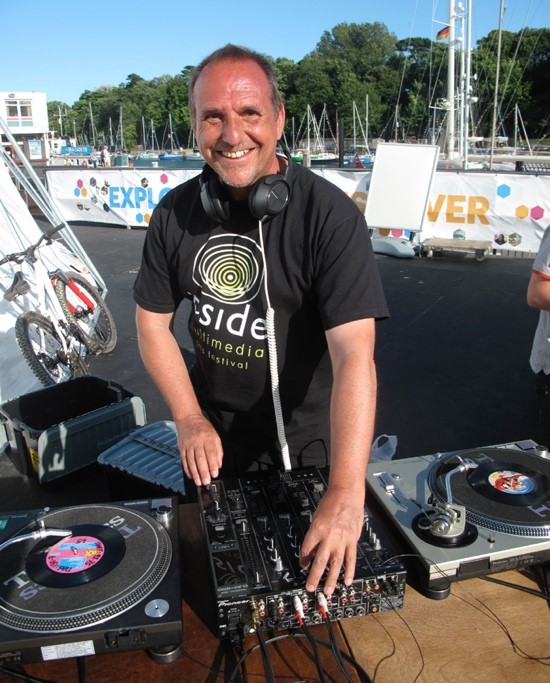 A man with DJ decks