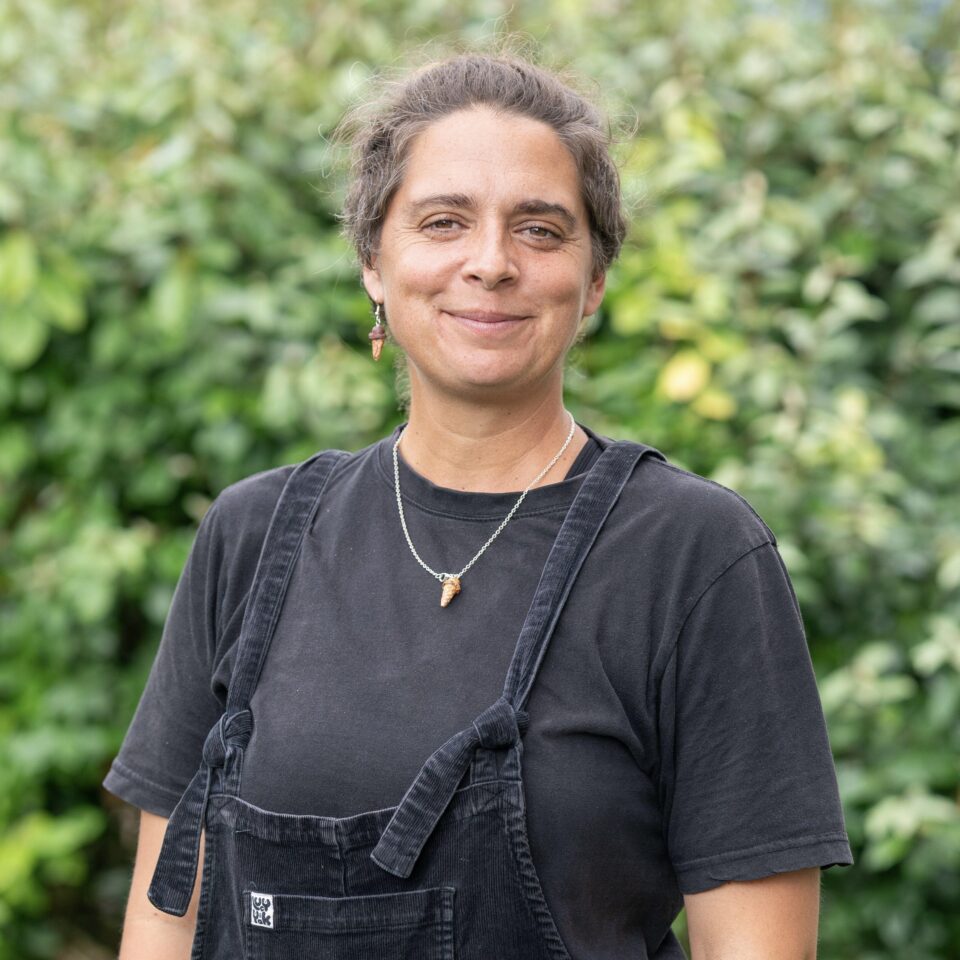 Director at b-side festival Rocca Holly-Nambi, who is helping residents living on the Bibby Stockholm barge in Portland to take part in an art class at Portland Community Venue engaging in a portrait and painting session, where the artworks will be showca